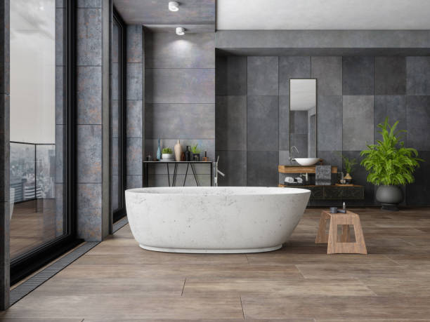 Bathroom tile dark flooring with bath tub | Boyer’s Floor Covering